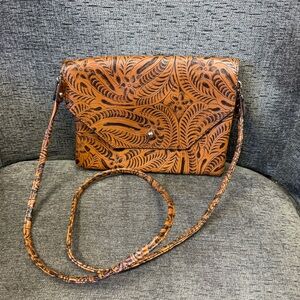 Street Level Floral Embossed Tan Leather Crossbody Bag with 3 Compartments.